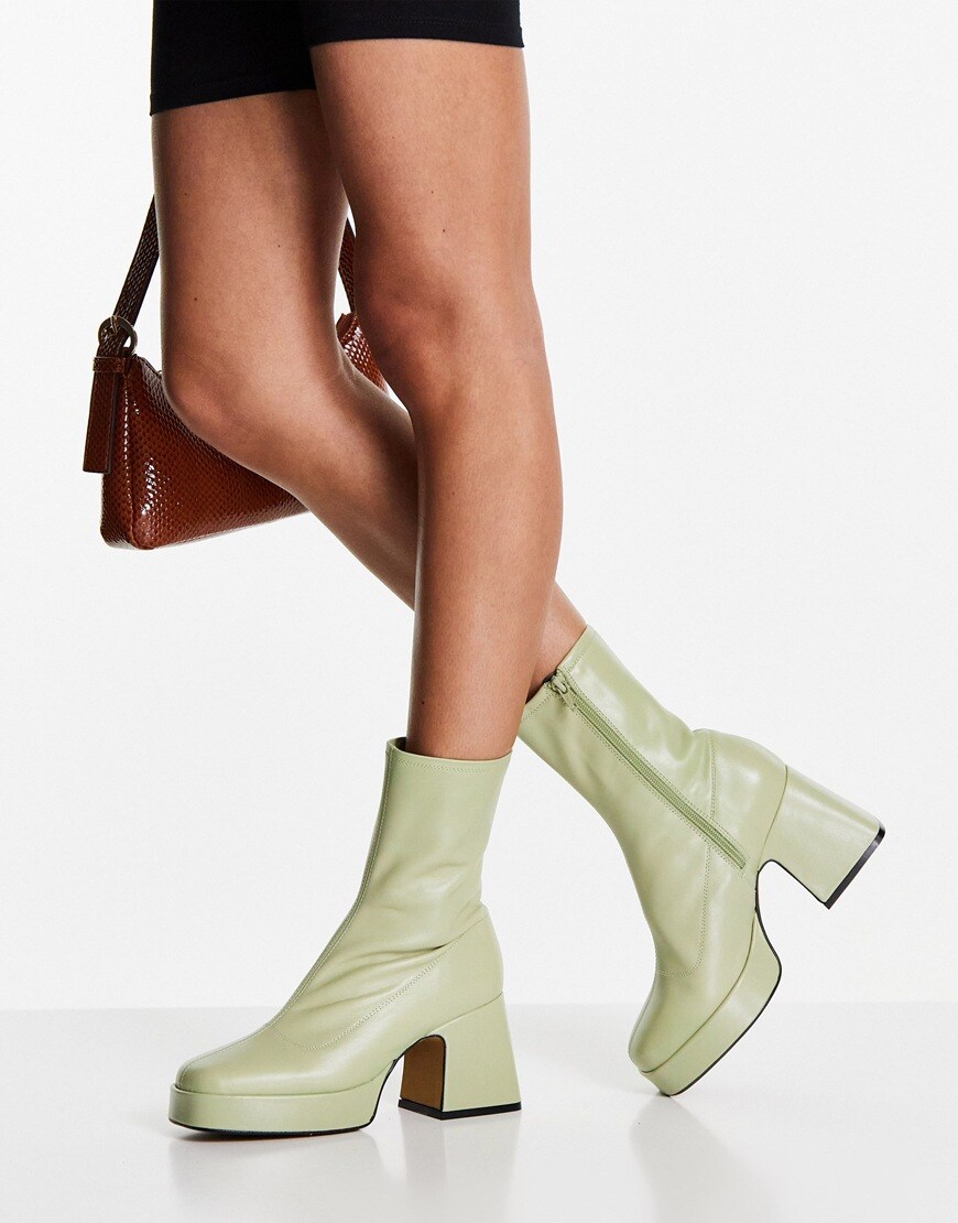An image of a pair of green boots by Topshop | ASOS Style Feed