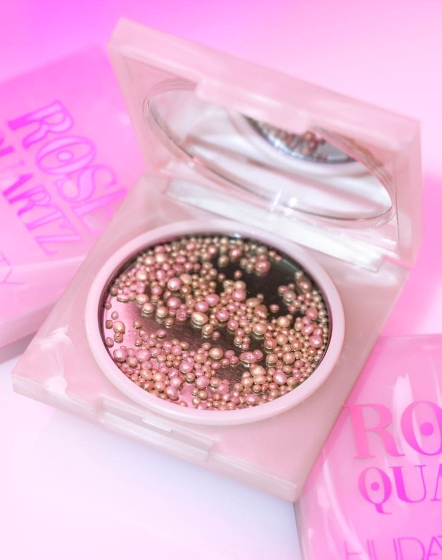 An image of the Huda Beauty Rose Quartz Face Gloss Highlighting Dew. | ASOS Style Feed