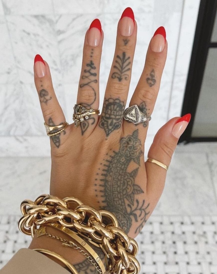 @jamiegenevieve shows us her nails. She's picked a red French tip and has accessorised with gold jewels. | ASOS Style Feed