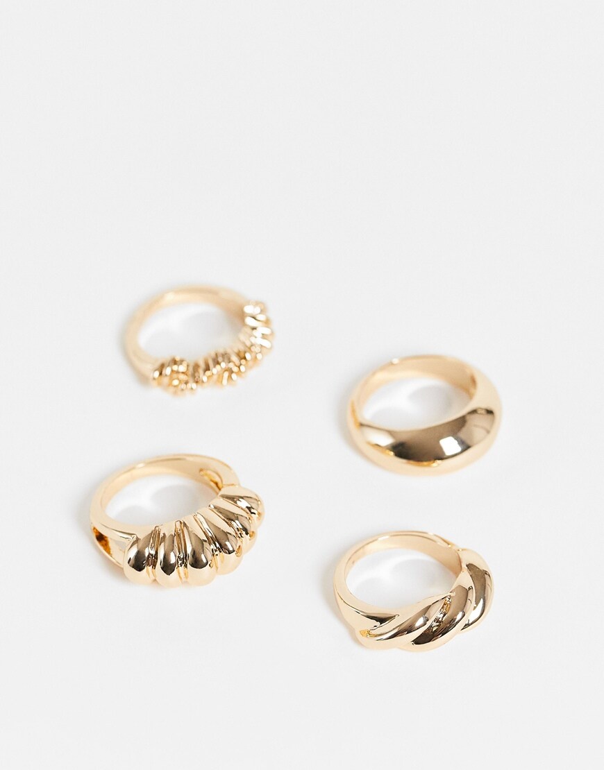 ASOS DESIGN pack of 4 rings in twist design in gold tone