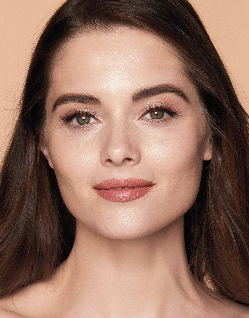 A model wears the Light Wonder Foundation from Charlotte Tilbury. | ASOS Style Feed