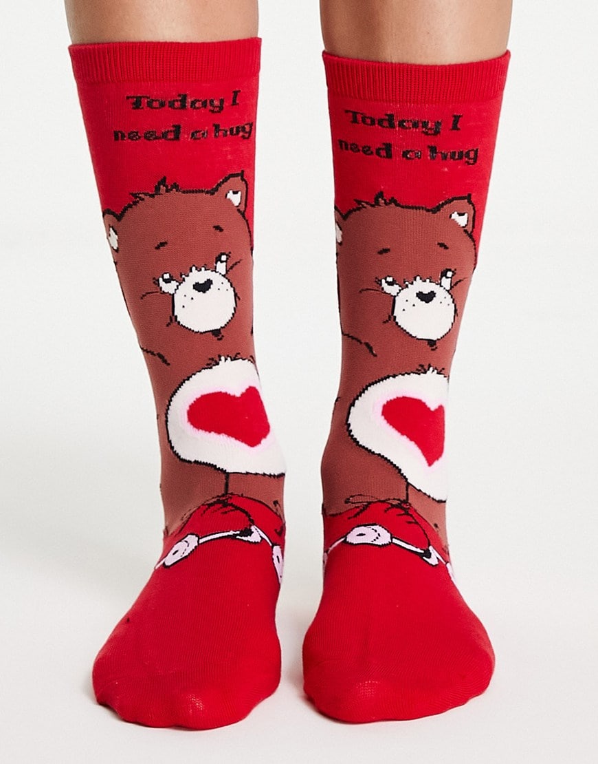 Typo x Care Bears socks with 'need a hug' slogan in red | ASOS Style Feed
