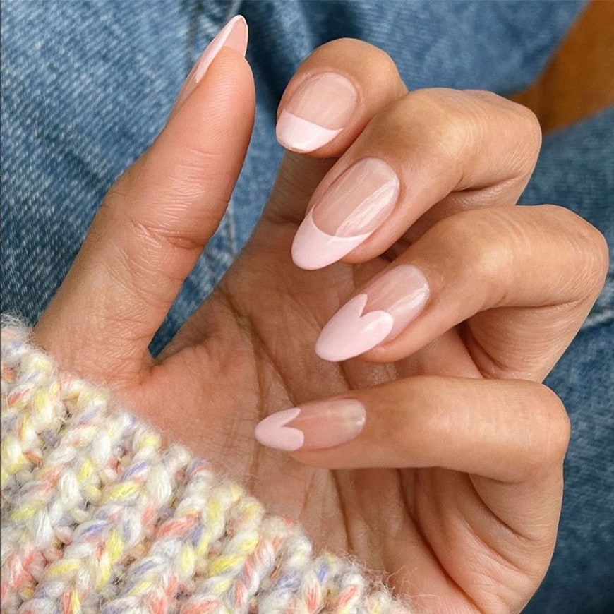 @overglowedit has pink French tips in the shape of hearts on their nails. | ASOS Style Feed