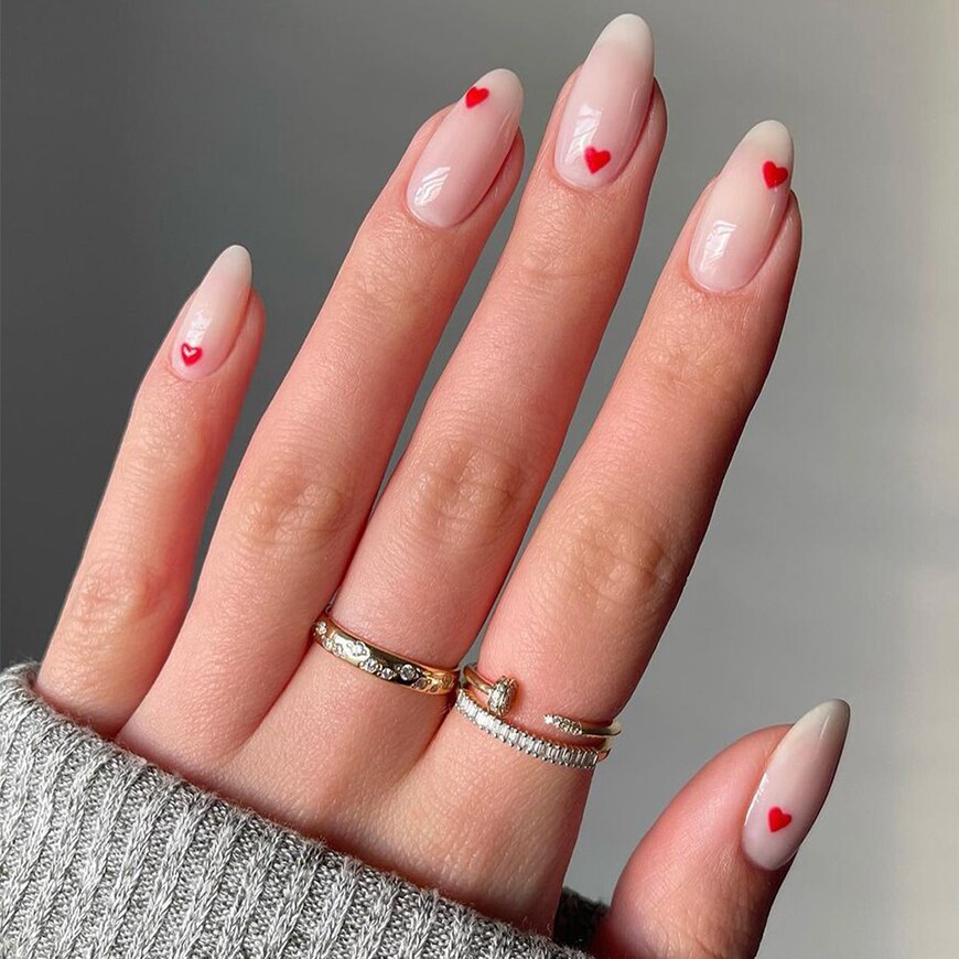 @heluviee has clear nails with mini red hearts on each. | ASOS Style Feed