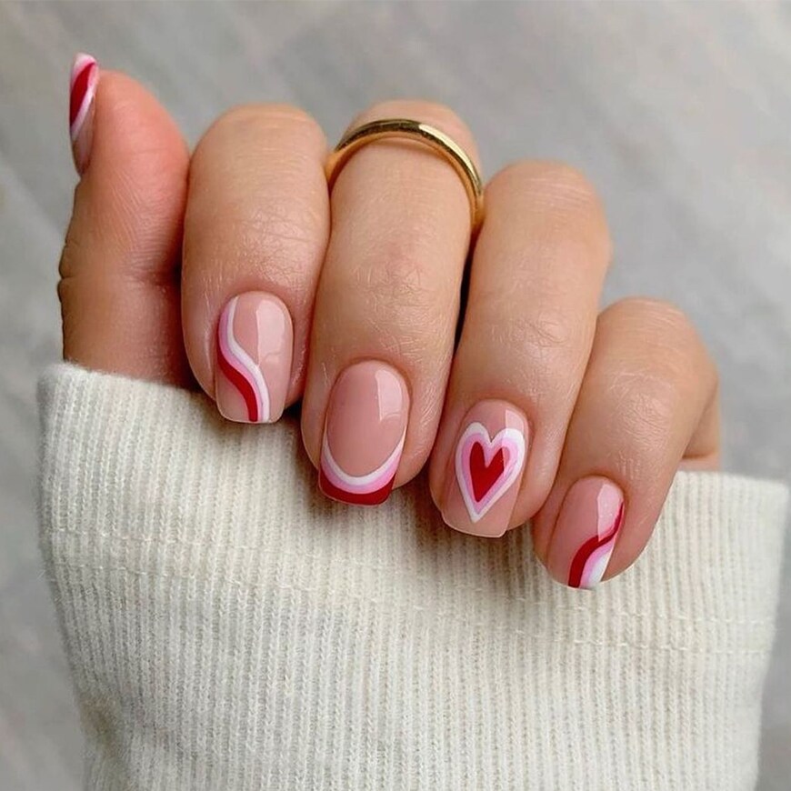 @charsgelnails_ wears a 70s style red, white and pink design with a heart. | ASOS Style Feed