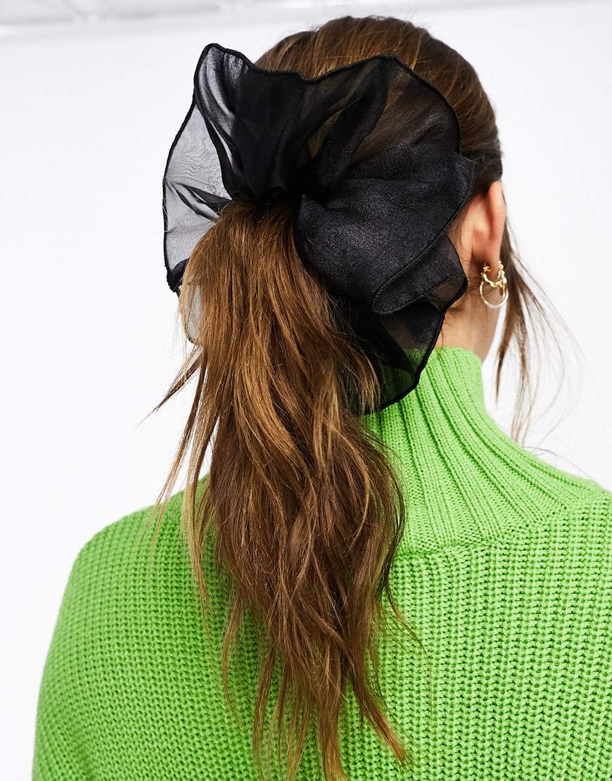 Model wearing oversized scrunchie in black | ASOS Style Feed
