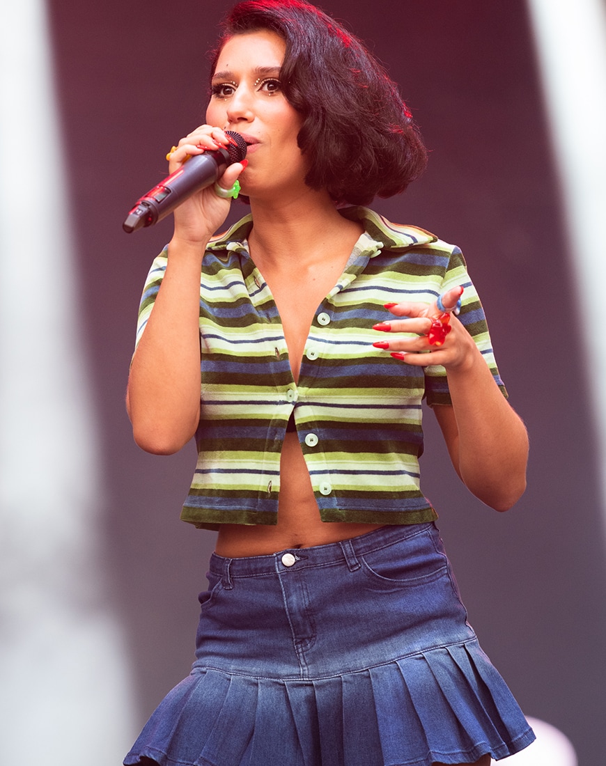 Raye performing on stage | ASOS Style Feed