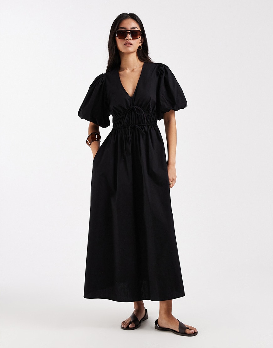 Model Wearing Black Dress