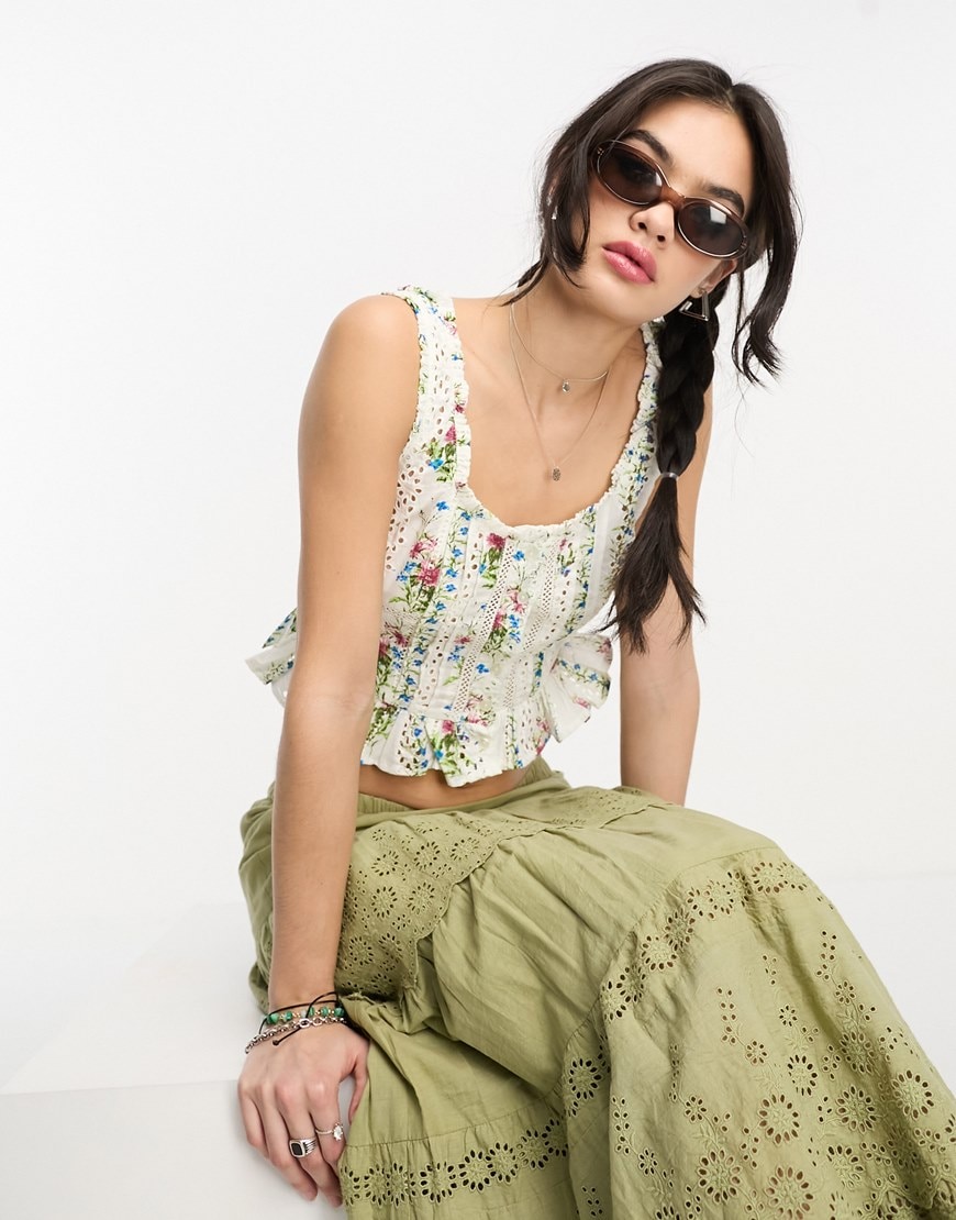 Woman wearing broderie corset | ASOS Style Feed