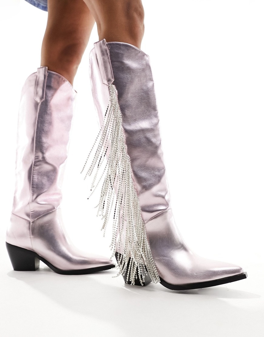 A woman wearing pink cowboy boots with rhinestone fringing | ASOS Style Feed