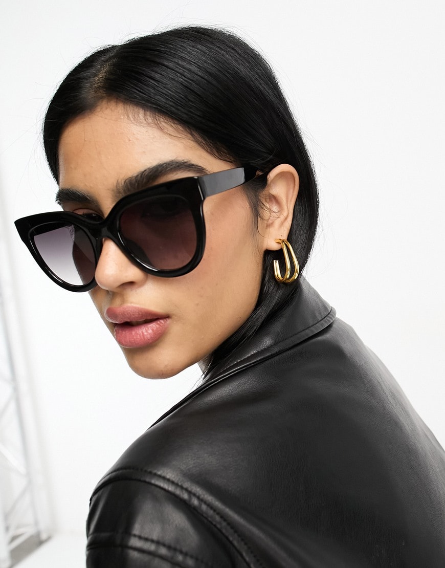 Woman wearing cat eye sunglasses| ASOS Style Feed