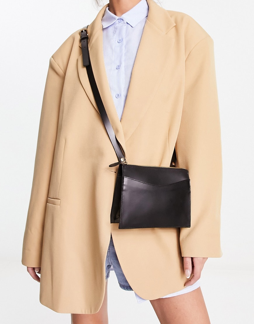 Woman wearing leather crossbody bag| ASOS Style Feed