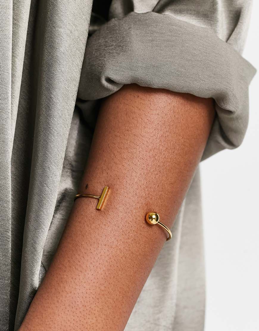 Woman wearing gold bracelet | ASOS Style Feed