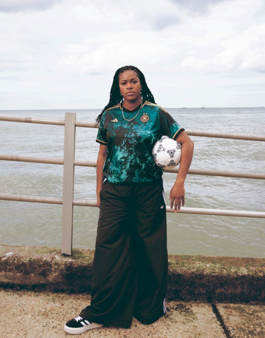 Woman wearing green football jersey | ASOS Style Feed