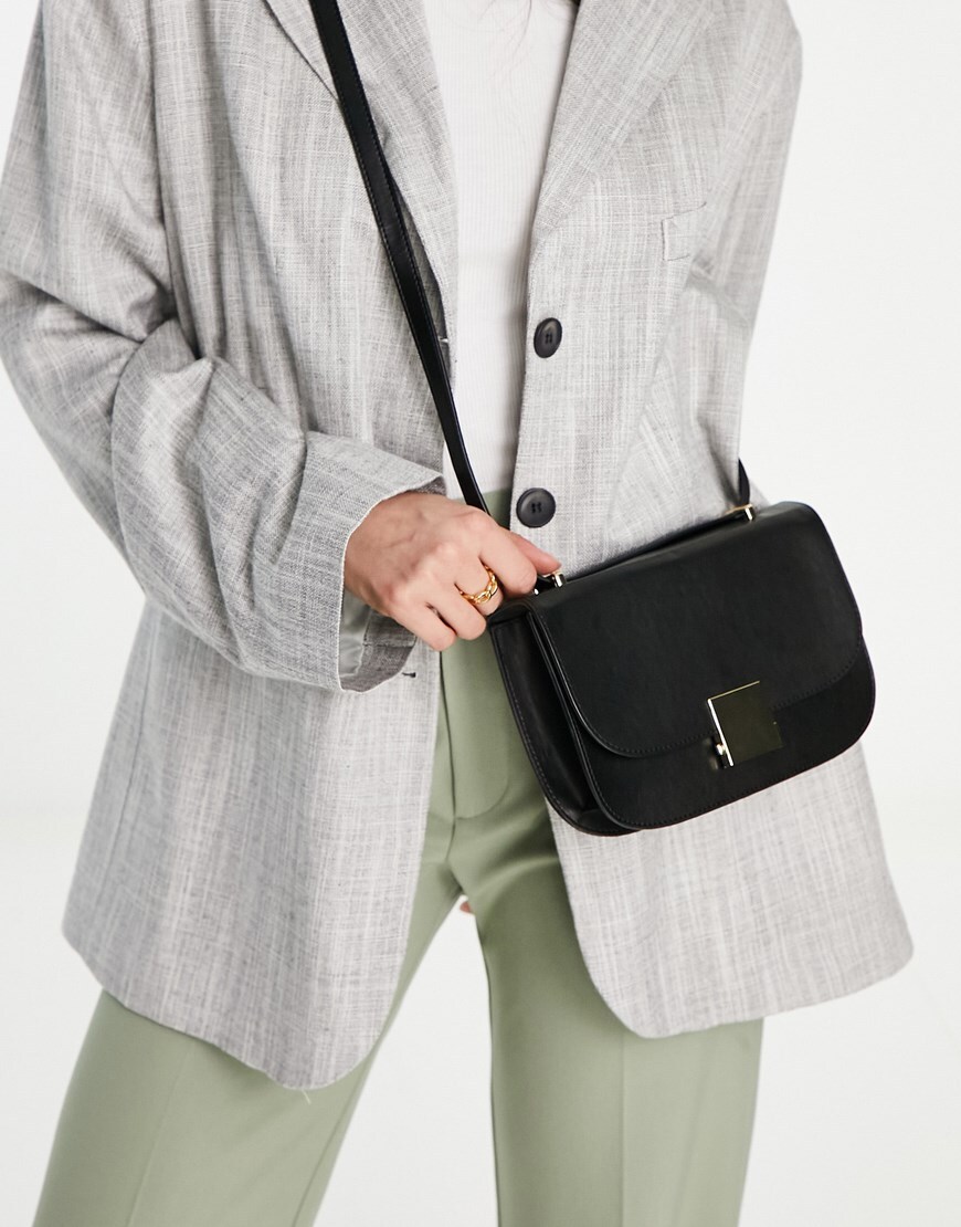 ASOS DESIGN crossbody bag with gold hardware detailing in black
