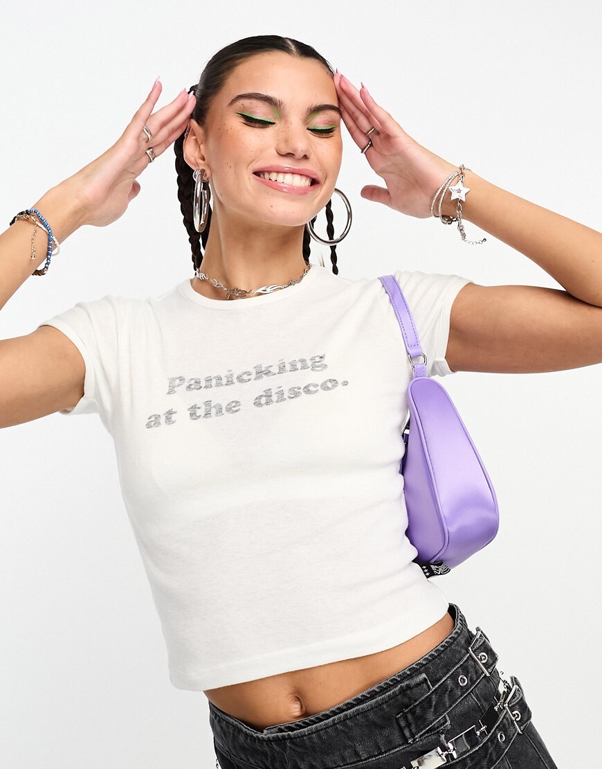 model wearing white slogan t-shirt