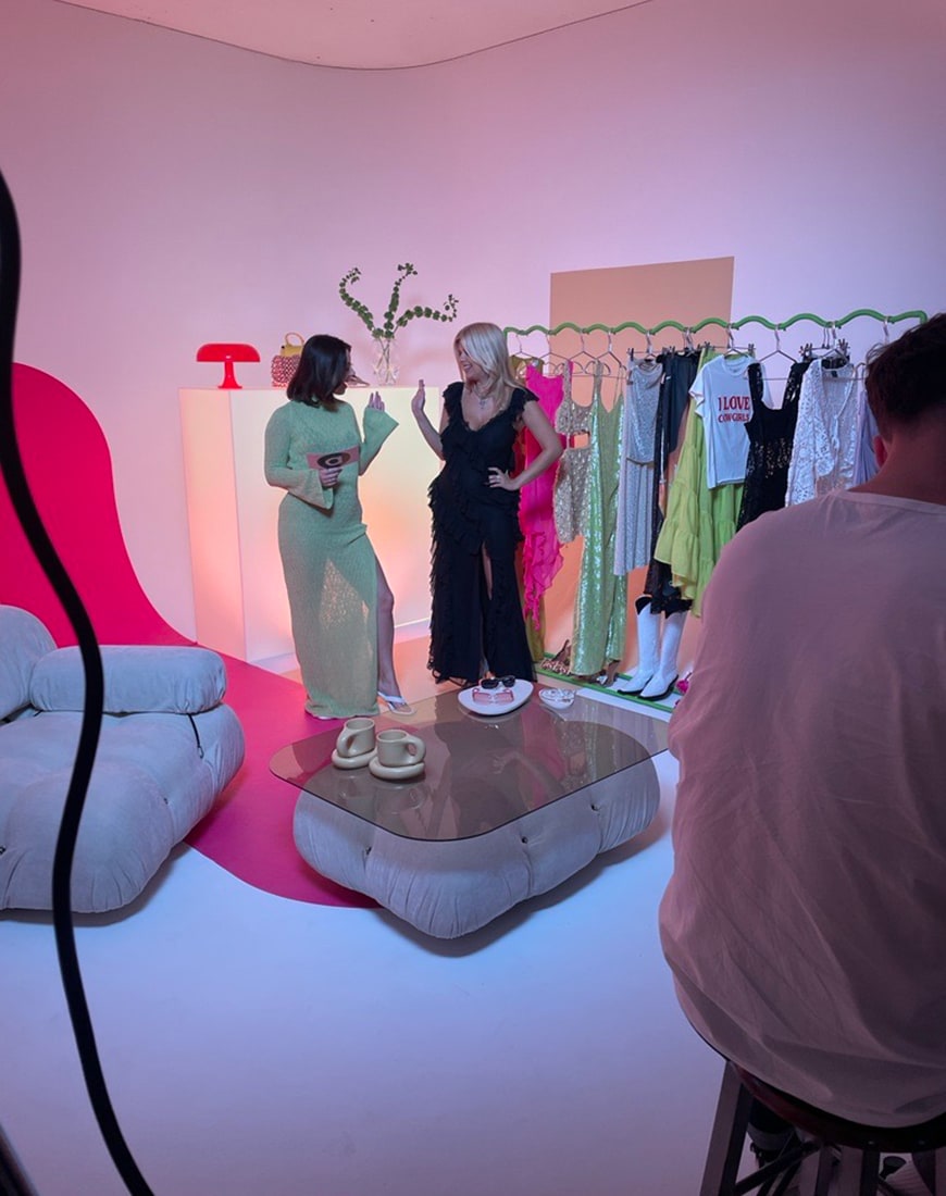 Chloe Griffin on Stylist Spotlight set in black dress and Charley in green dress | ASOS Style Feed