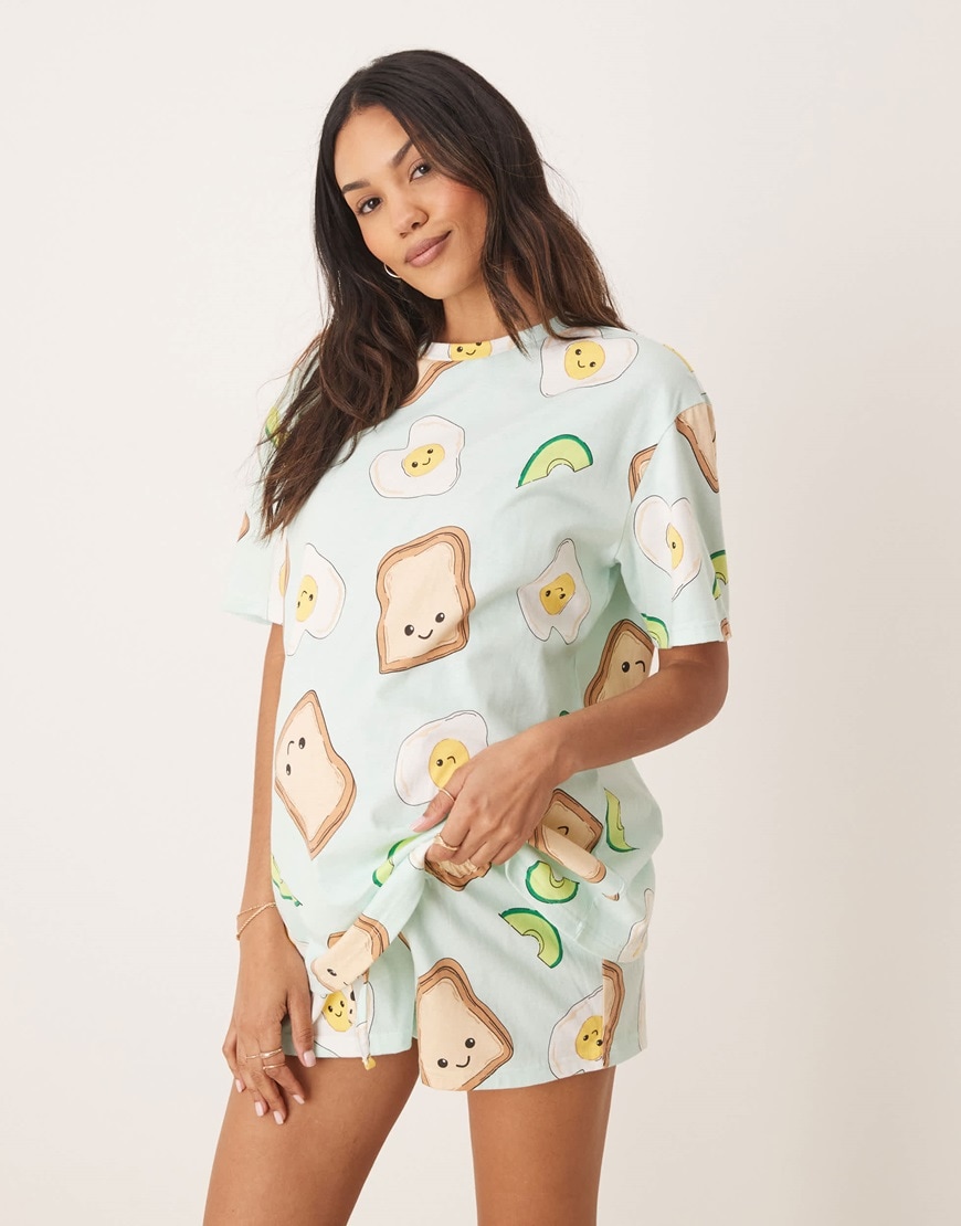 A woman wearing white and red printed pyjamas | ASOS Style Feed