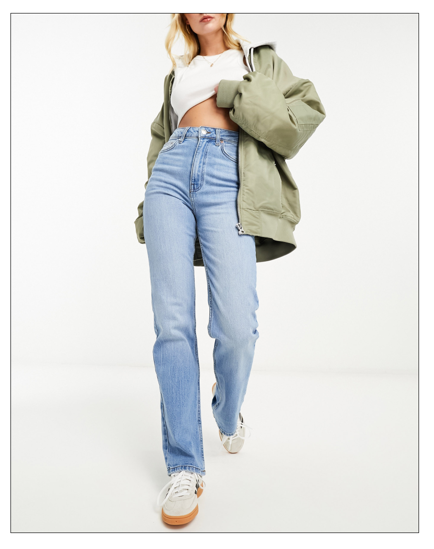 model wearing straight leg jeans