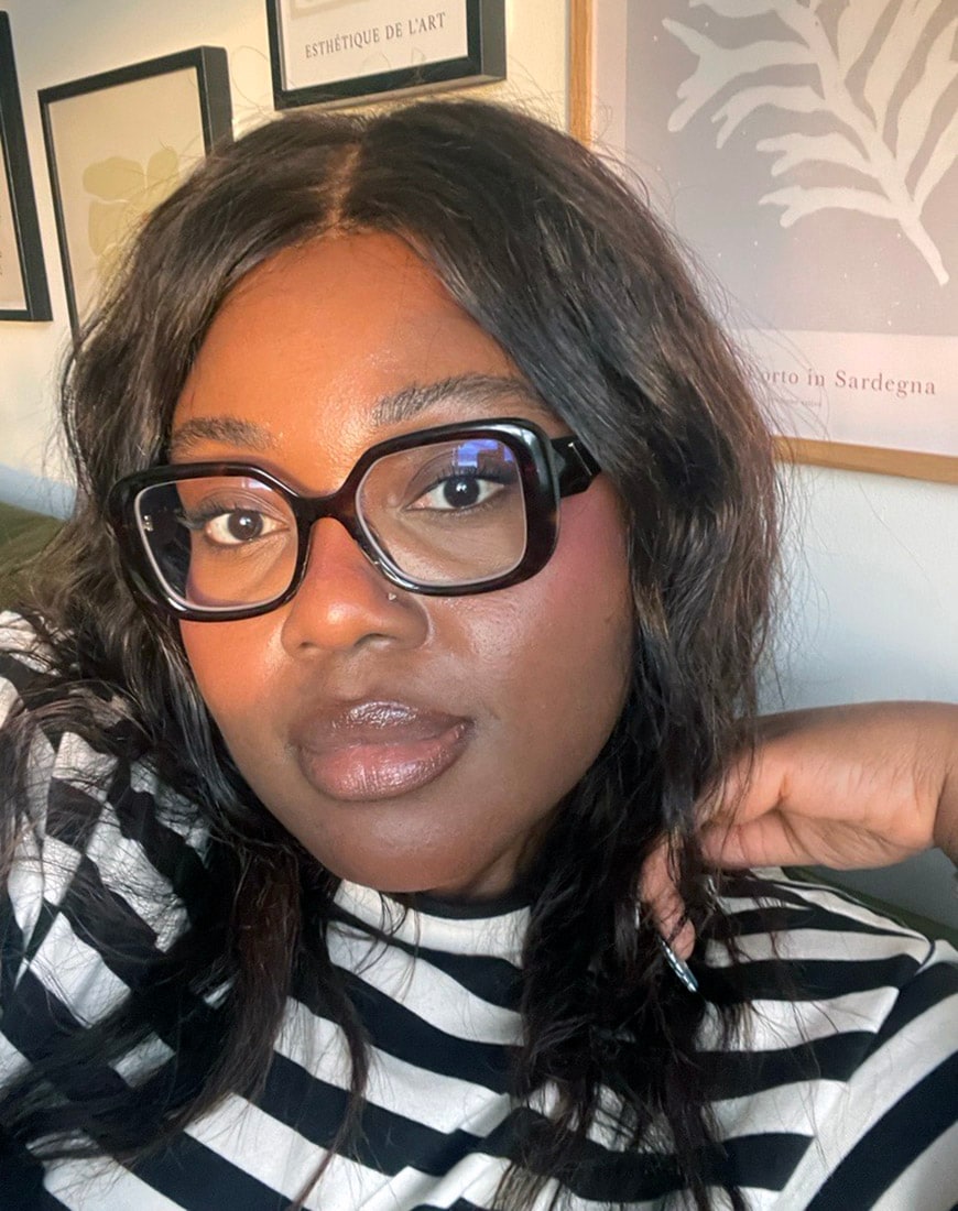 Girl in stripes wearing lip gloss | ASOS Style Feed