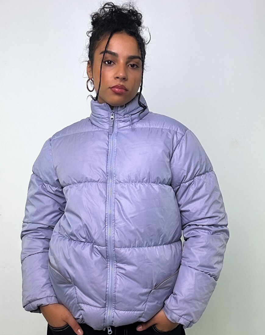 model wearing lilac puffer jacket