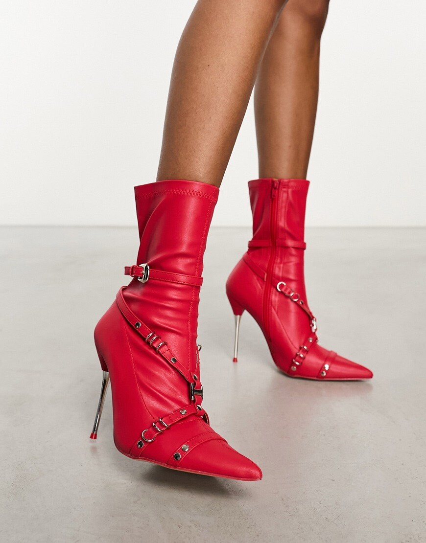 model wearing red boots