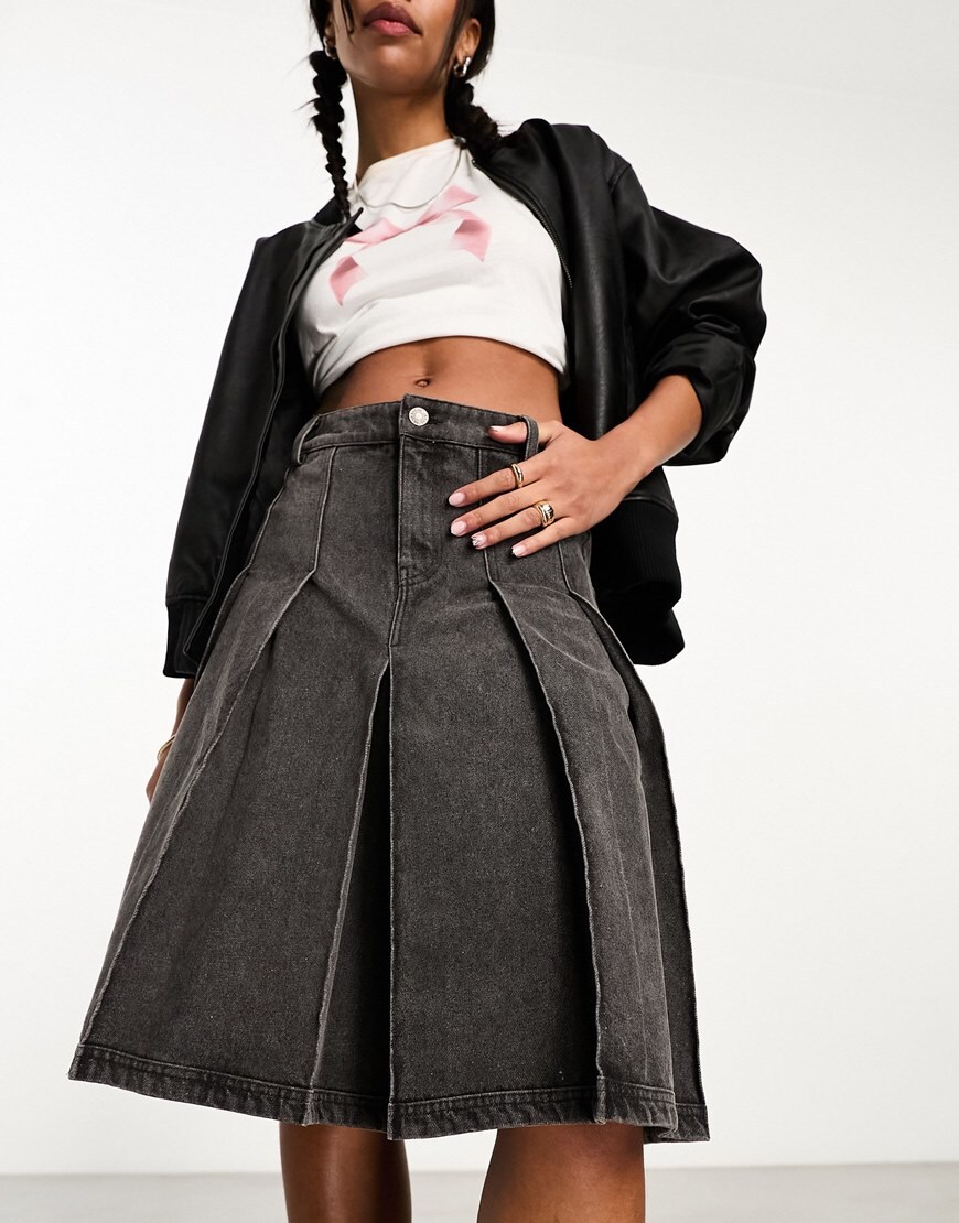 model wearing denim skirt