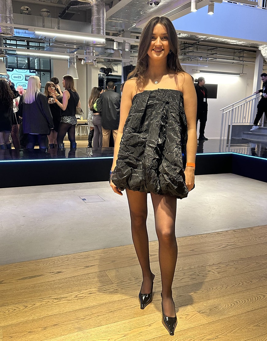 model wearing black dress