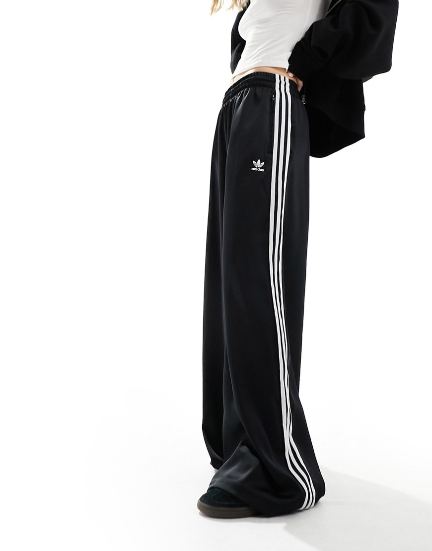 model wearing black joggers