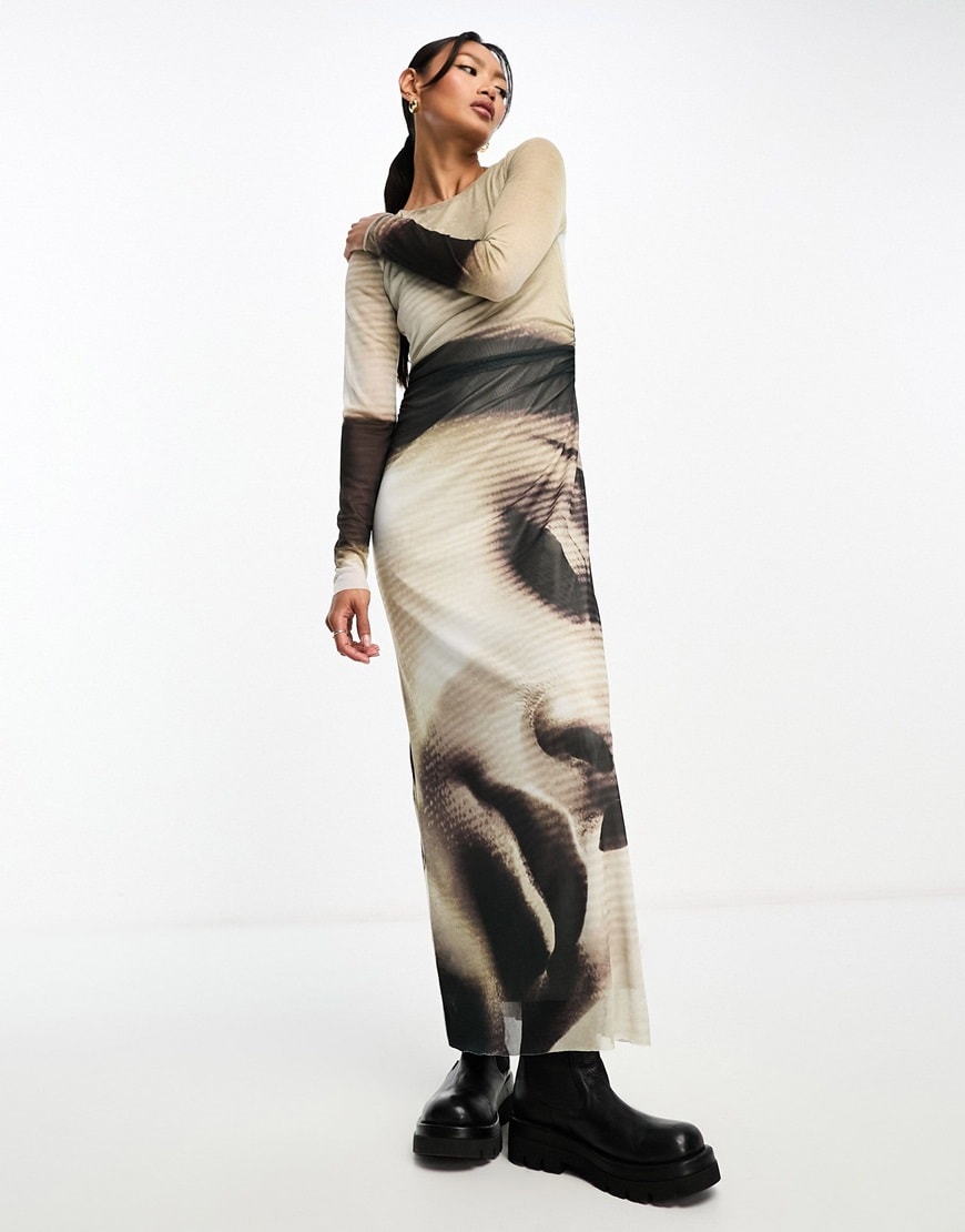 model wearing graphic print maxi dress