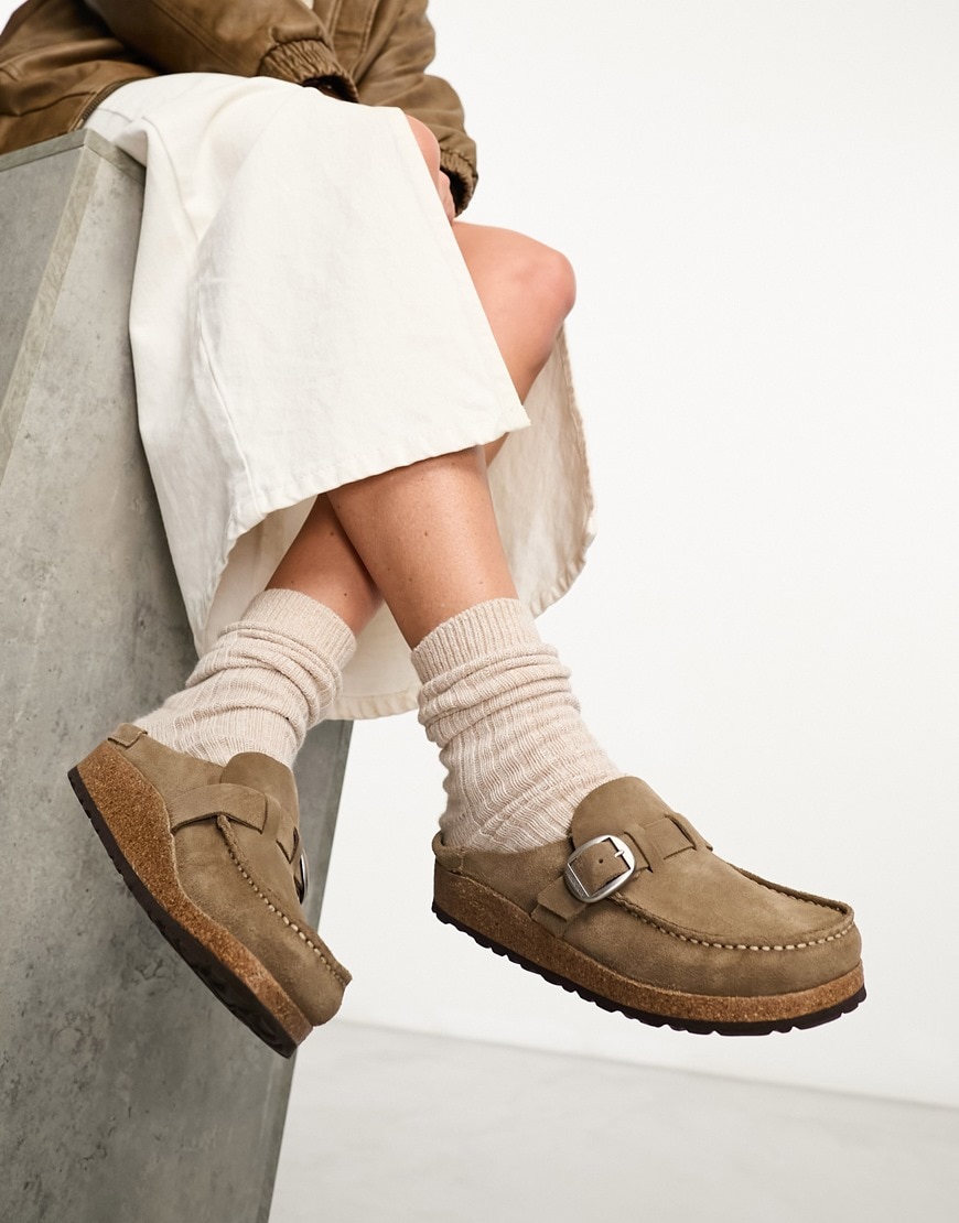 model wearing tan birkenstocks
