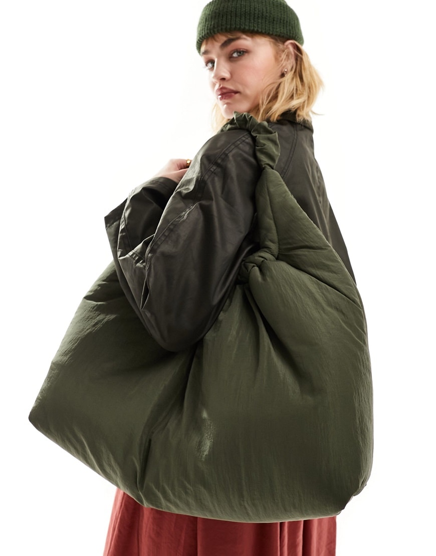 Woman wearing green bag | ASOS Style Feed