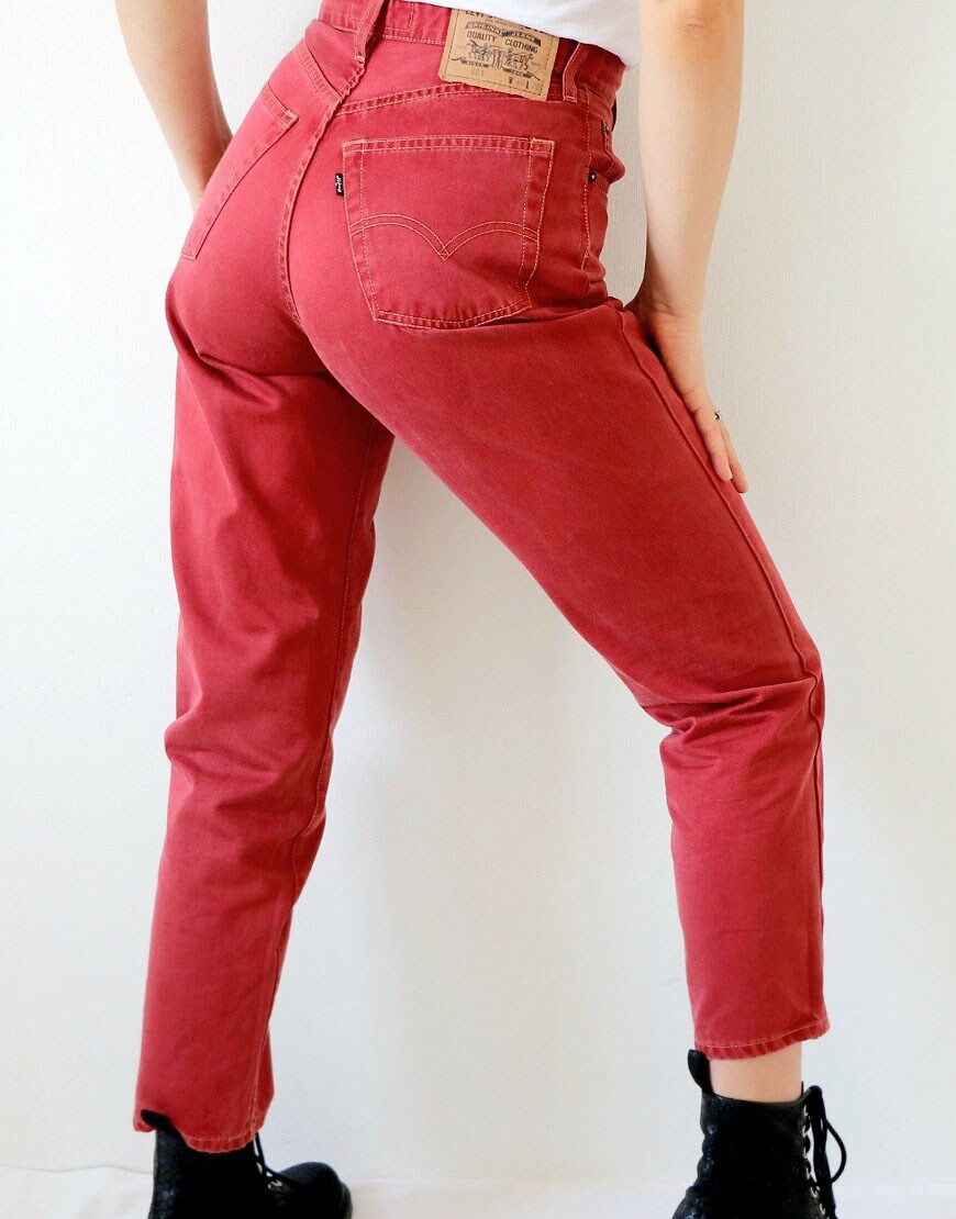model wearing red levis jeans