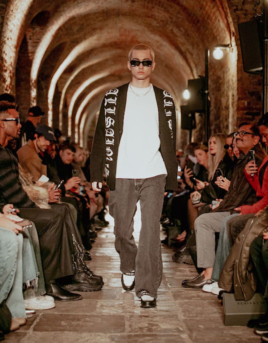 Model walking down the runway in cardigan | ASOS Style Feed