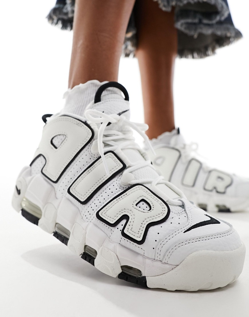 Woman wearing Nike Air Uptempo trainers in white and black | ASOS Style Feed
