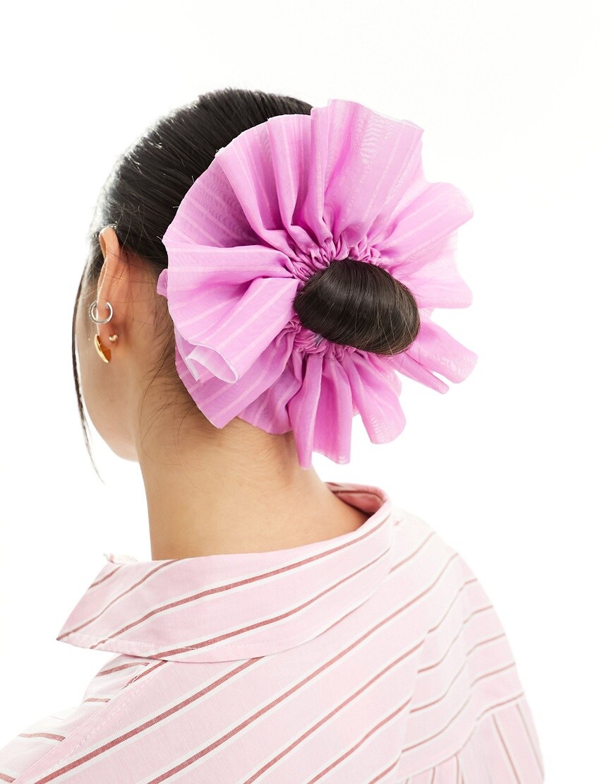 Woman wearing big pink scrunchie | ASOS Style Feed