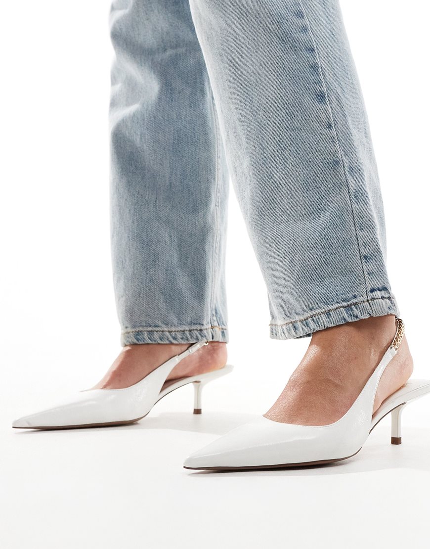 White pointed-toe kitten heels with chain slingback