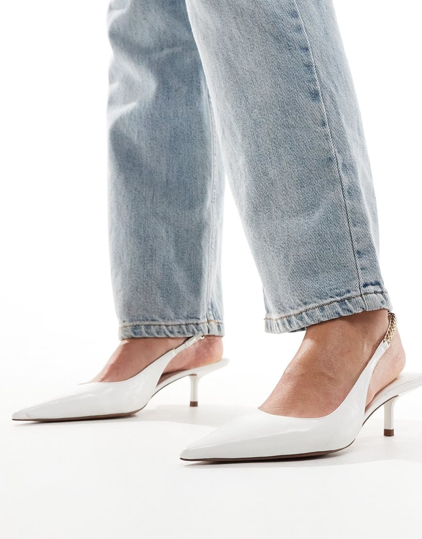 White pointed-toe kitten heels with chain slingback