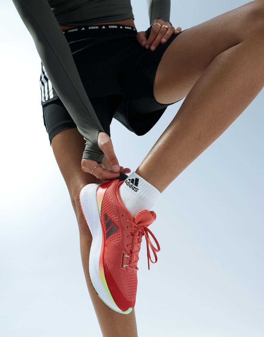 Adidas Running Adizero SL trainers in red and orange