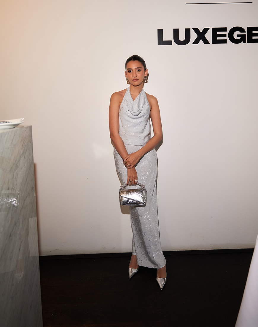 Sapna wearing silver maxi dress