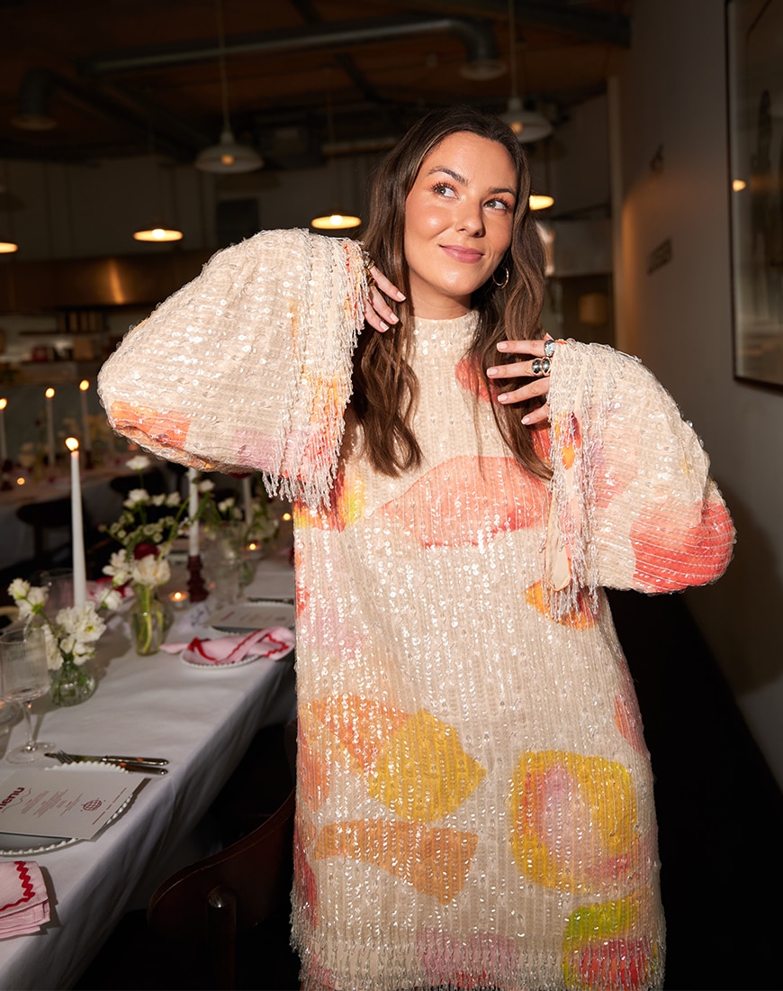 Stephanie wearing mini sequin dress