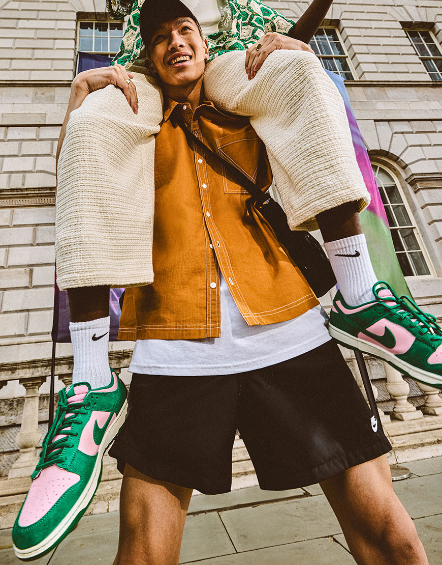 Model carring someone on their shoulders while wearing a festival outfit| ASOS Style Feed