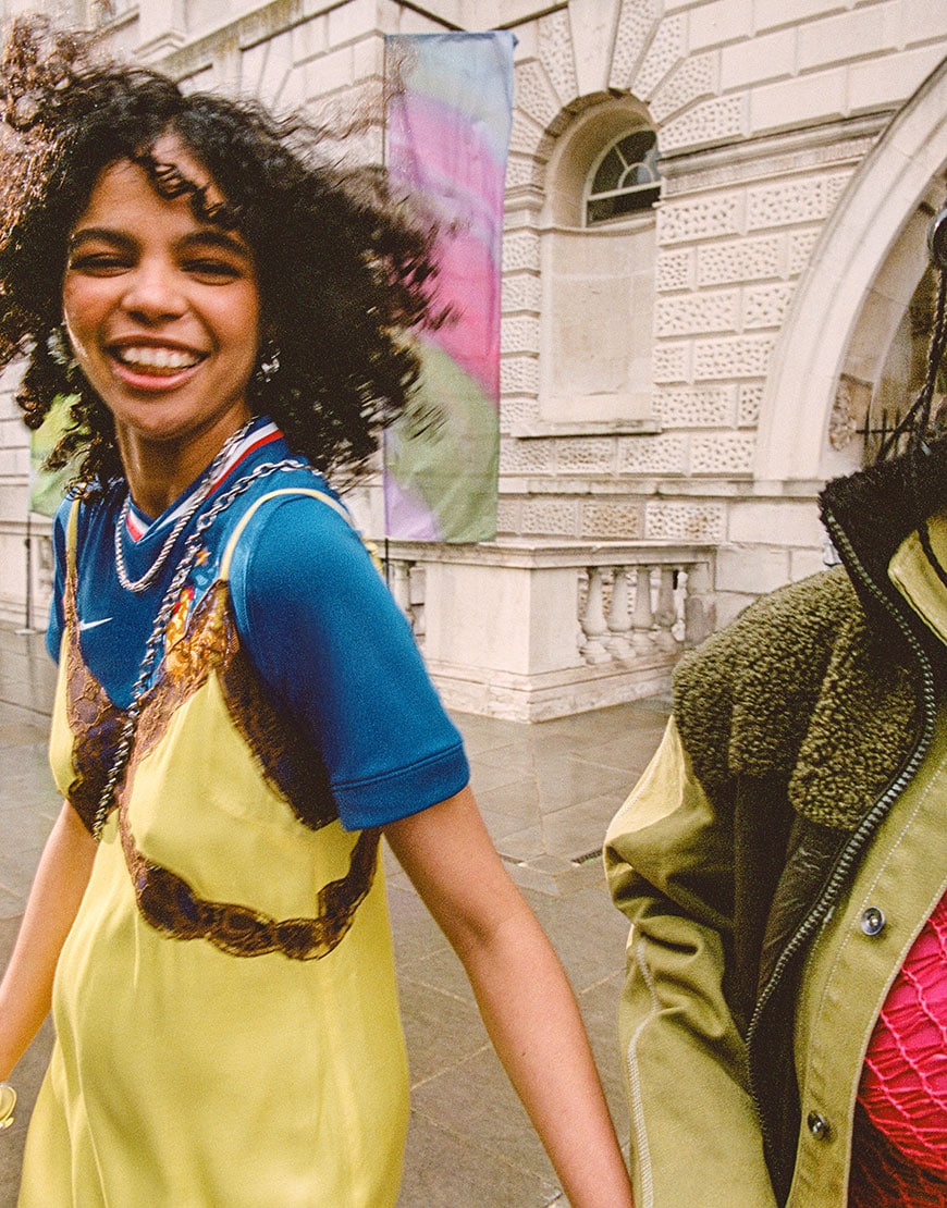 Model wearing football jersey under a mini dress | ASOS Style Feed