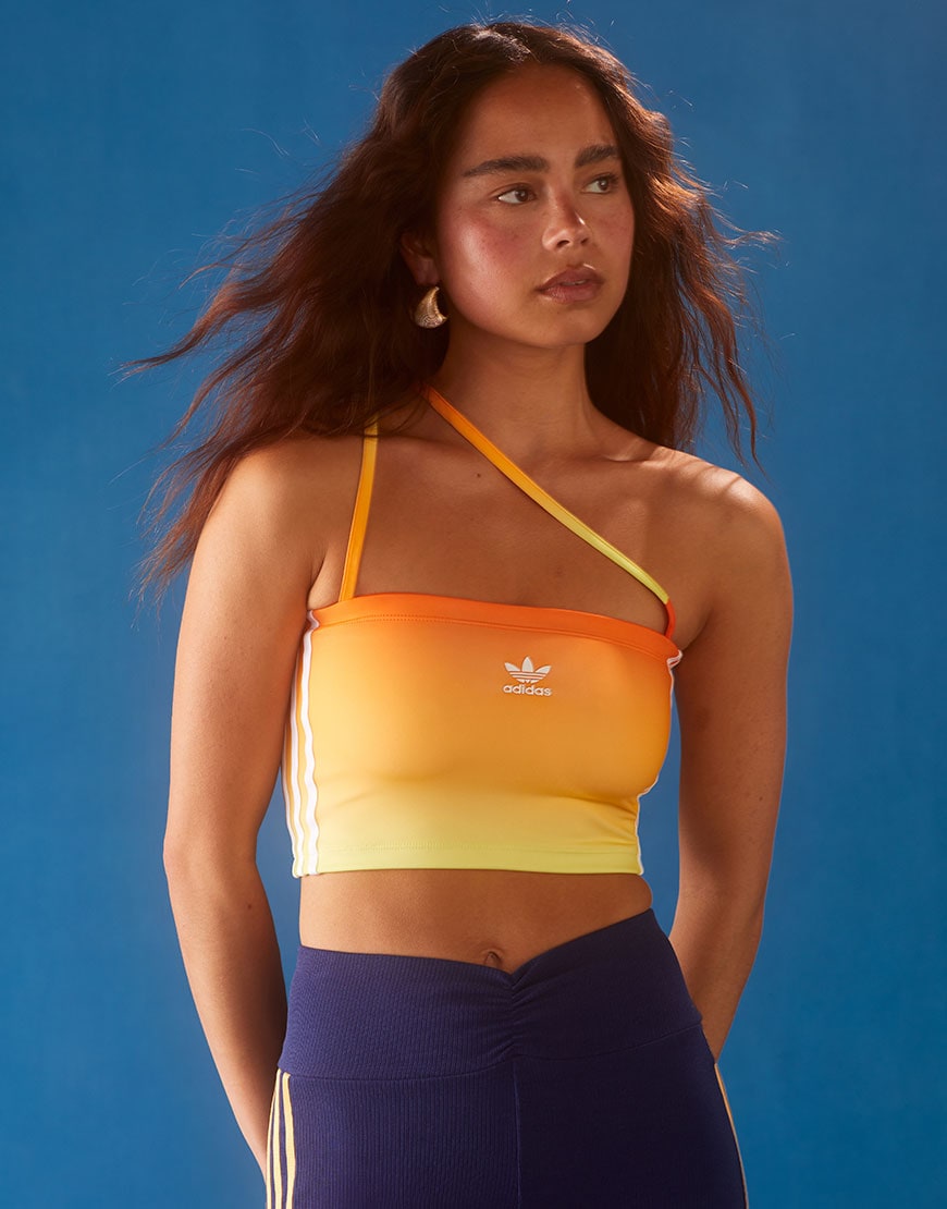 Model wearing adidas Originals halterneck tube top in ombre orange | ASOS Style Feed | ASOS Style Feed