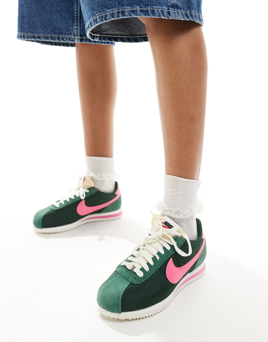 A model wearing green and pink Nike trainers | ASOS Style Feed