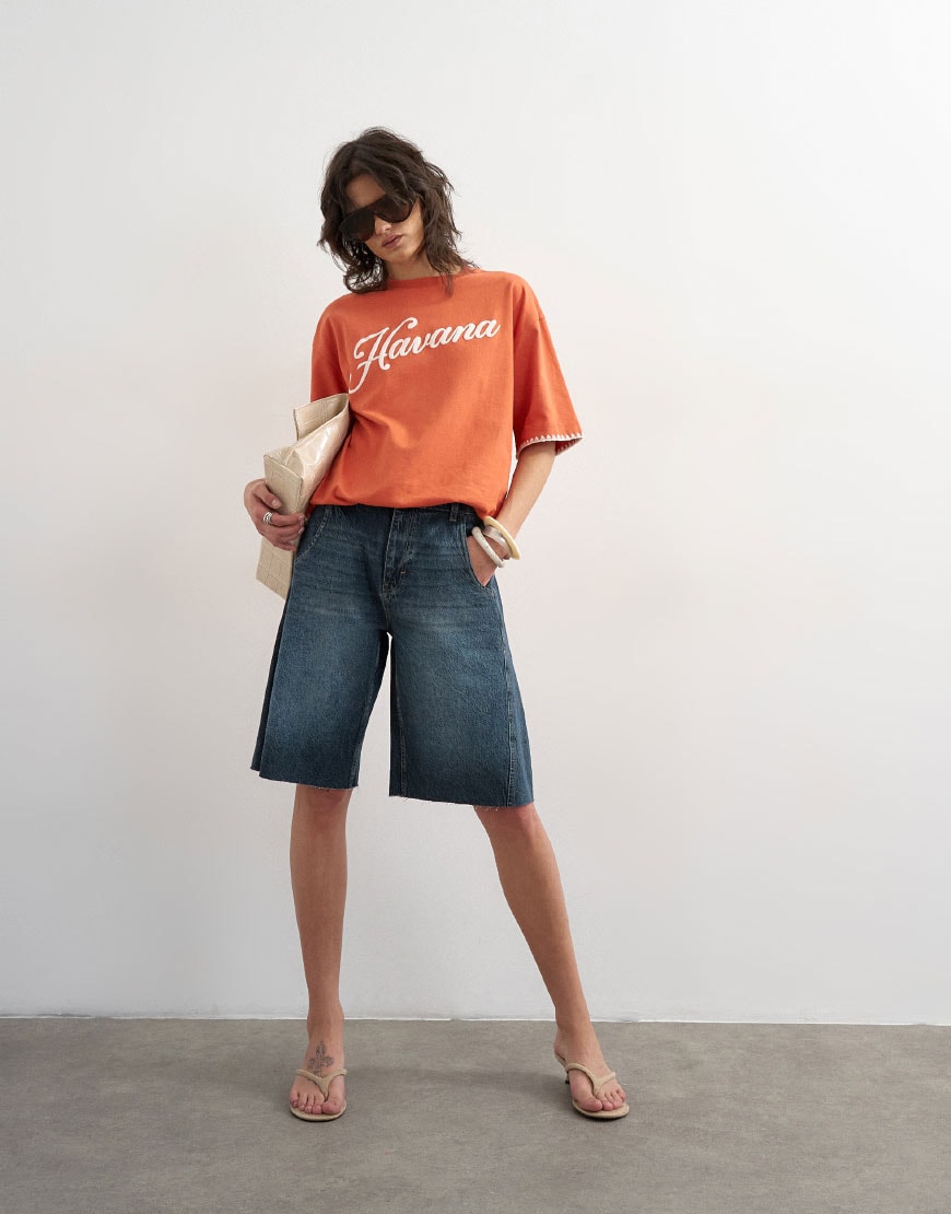 Model in top and checked skirt|ASOS Style Feed