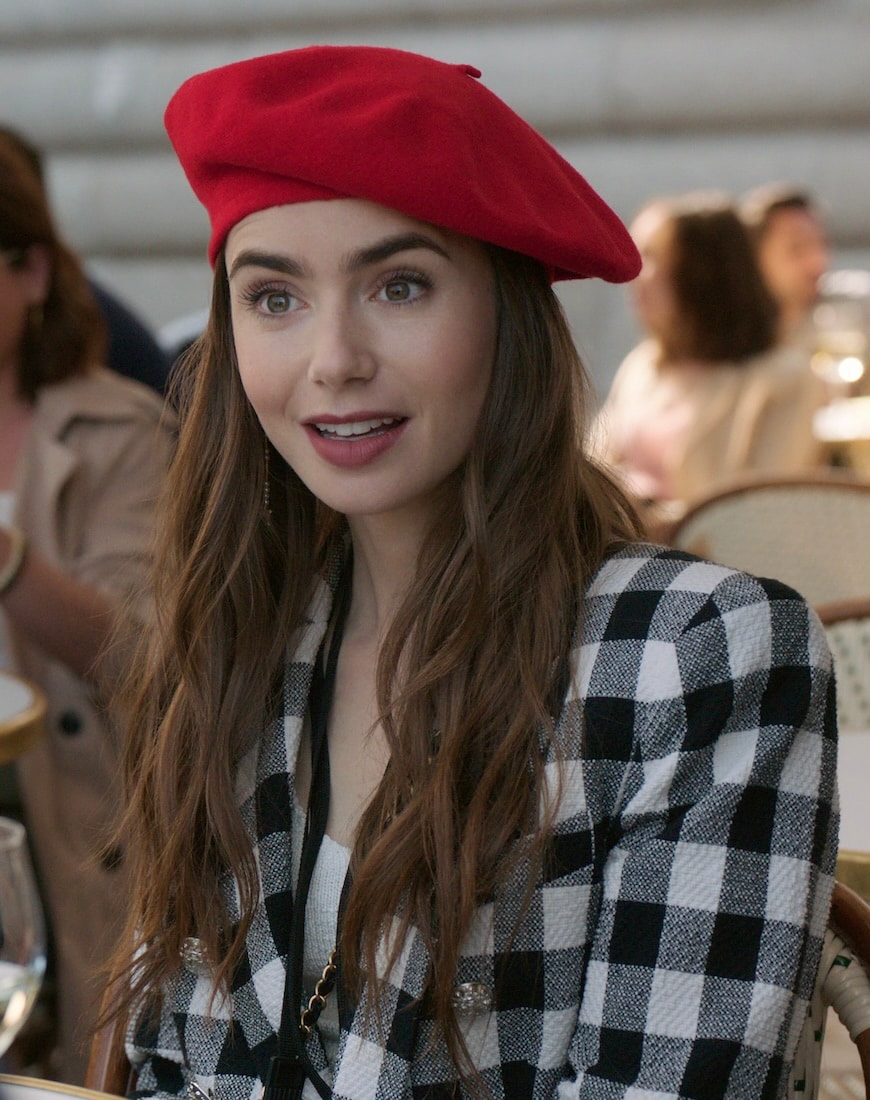 Emily in a beret and a blazer
