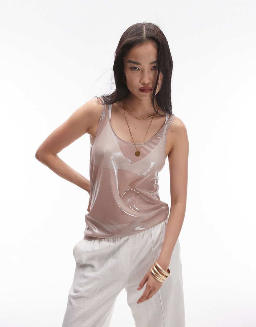 A model wearing a pink mesh top | ASOS Style Feed