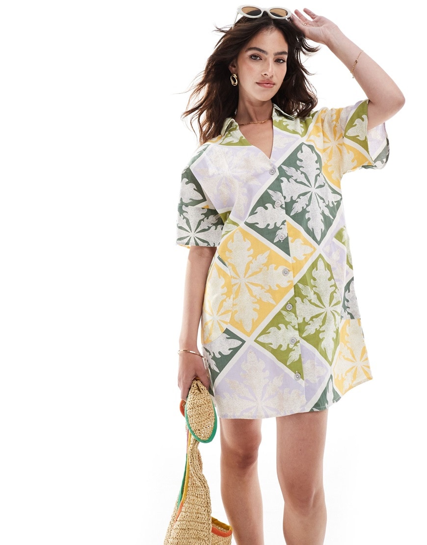 Woman wearing printed linen oversized shirt dress