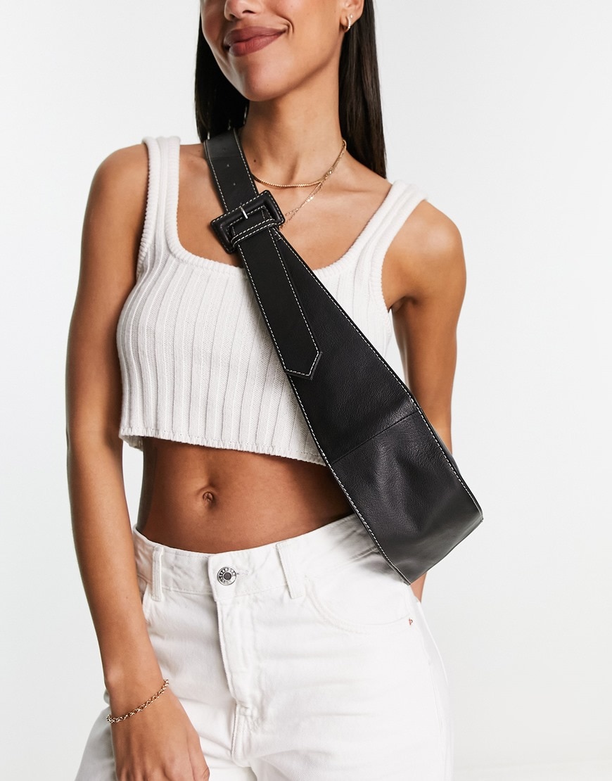 ASOS DESIGN leather curved base crossbody sling bag with contrast stitch in black | ASOS Style Feed